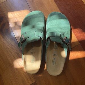 Green Birkenstock clogs